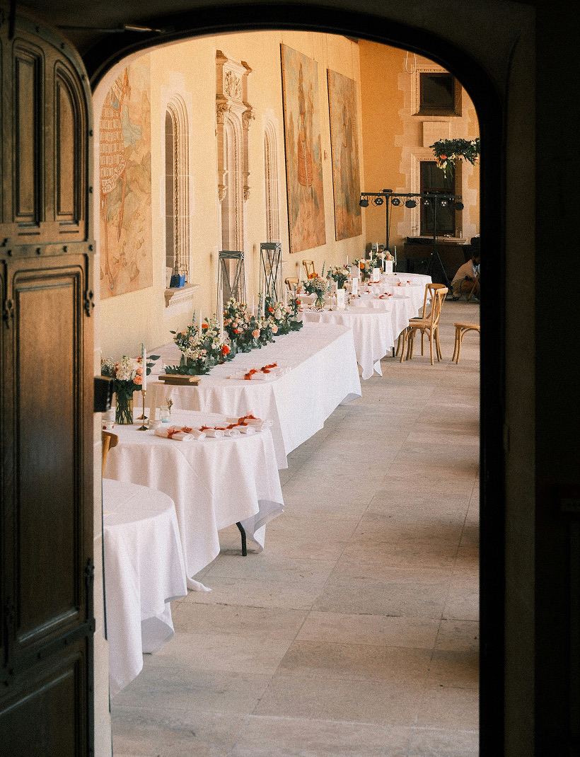 A banquet table dressed for dinner