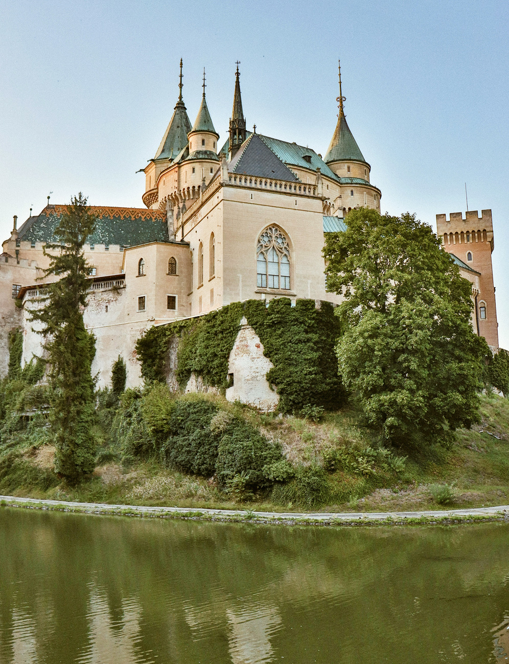 The château reflected in the water